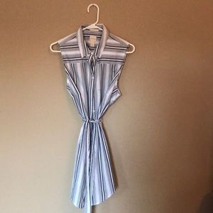 Chico’s Navy and white striped sleeveless shirt.